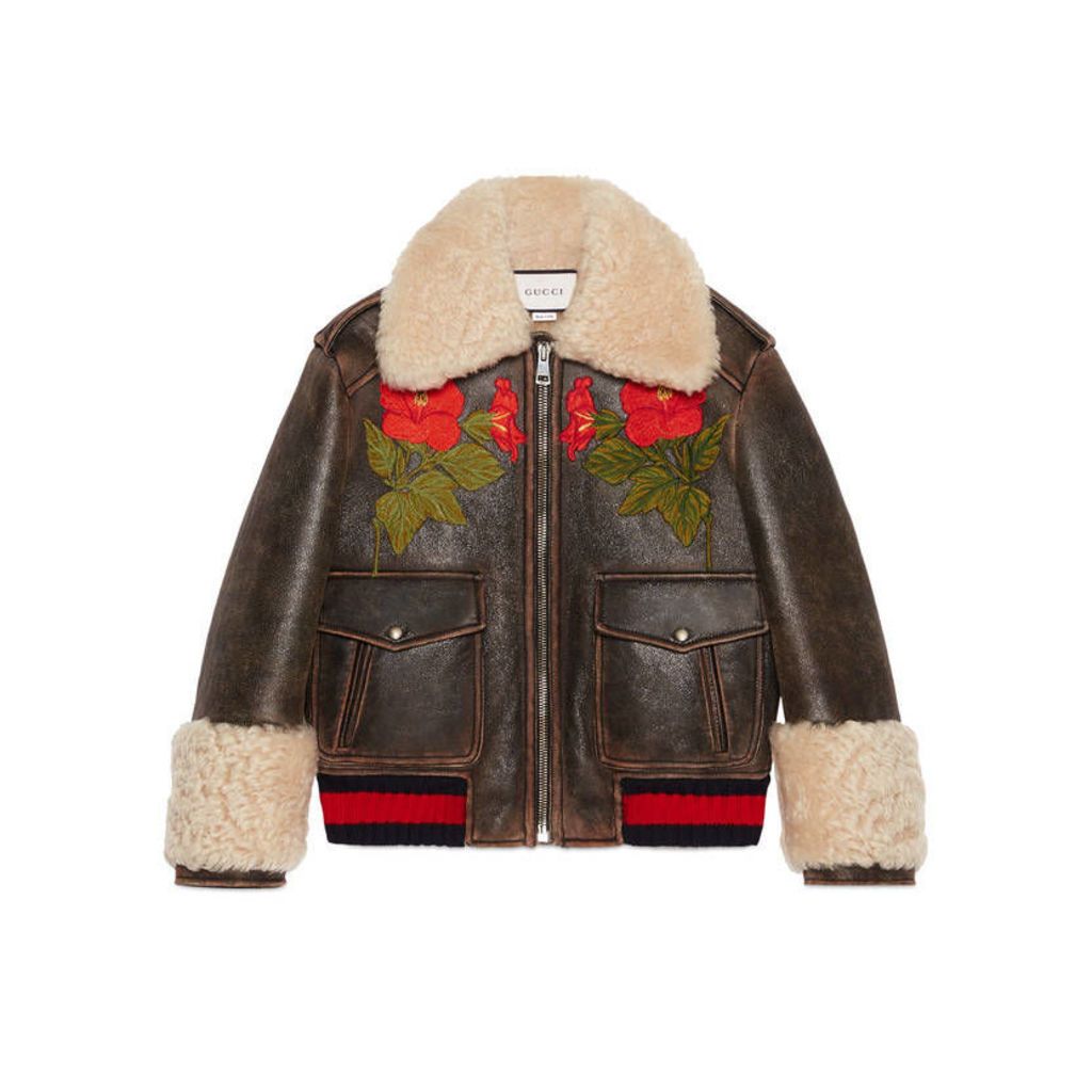 Embroidered leather bomber with shearling lining