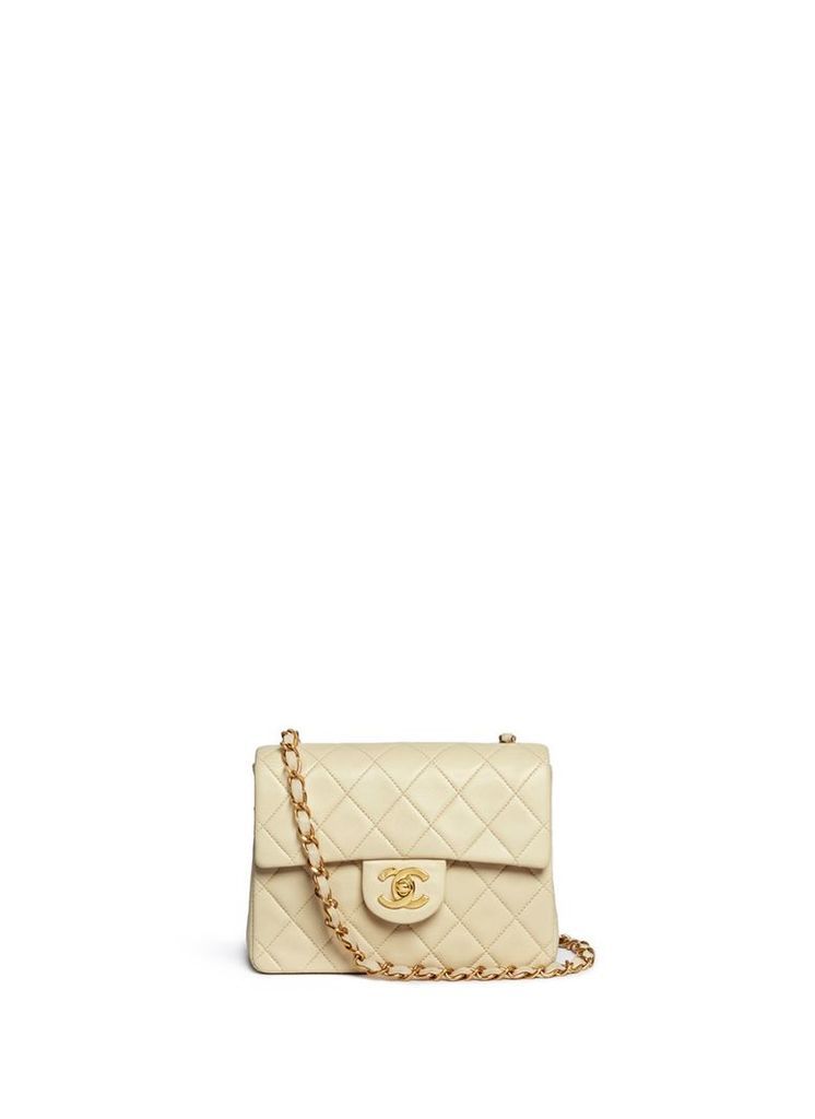 Mini quilted lambskin leather flap bag