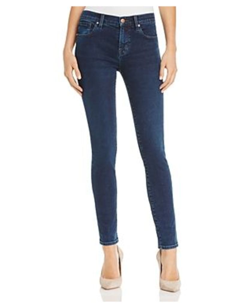 J Brand 620 Mid Rise Super Skinny Jeans in Throne