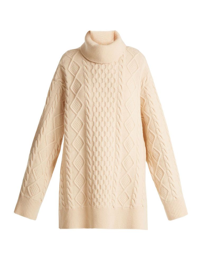 Split-side roll-neck wool cable sweater