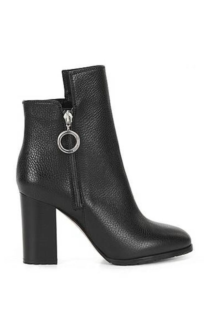 Ring-detailed ankle boots in Italian leather
