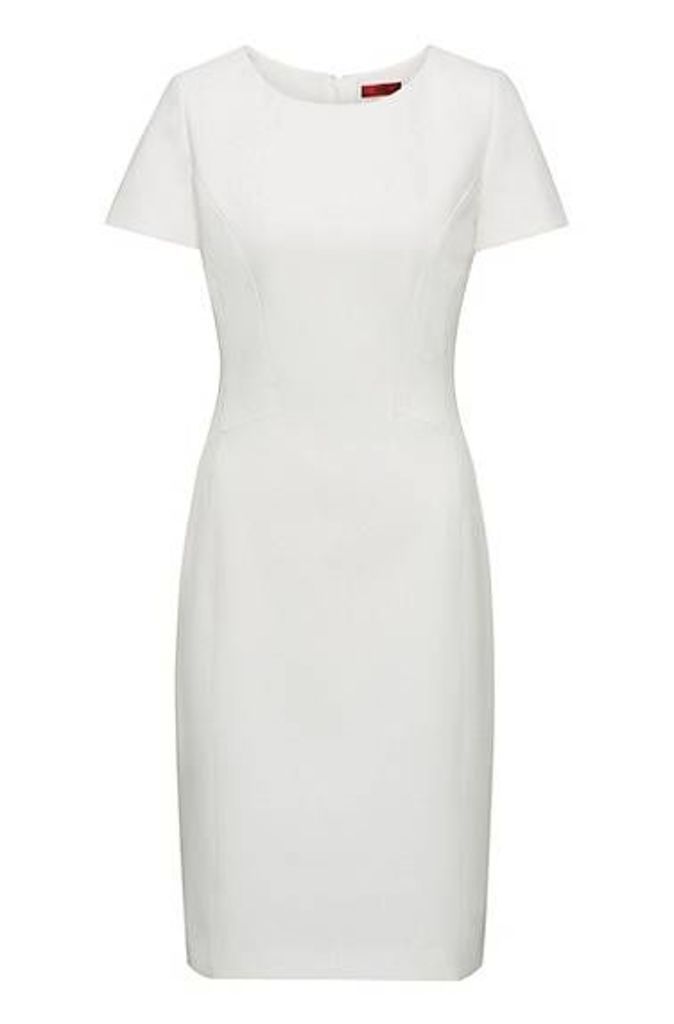 Fitted dress with feminine seaming