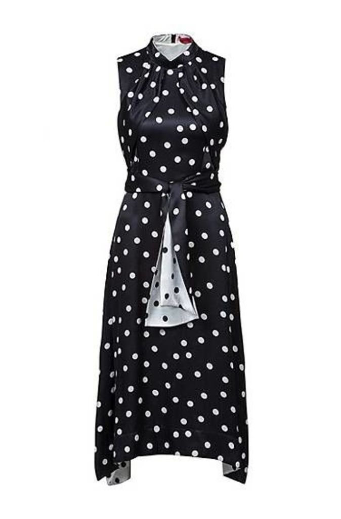 Sleeveless polka-dot dress with two-tone belt