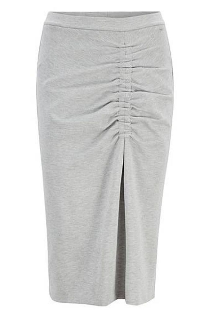 Jersey pencil skirt with asymmetric gathering