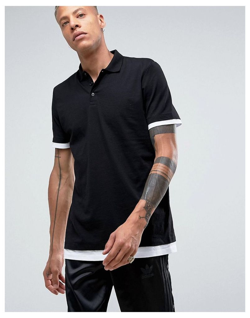 ASOS Longline Polo Shirt With Contrast Cuff And Hem Extender In Black/White - Black
