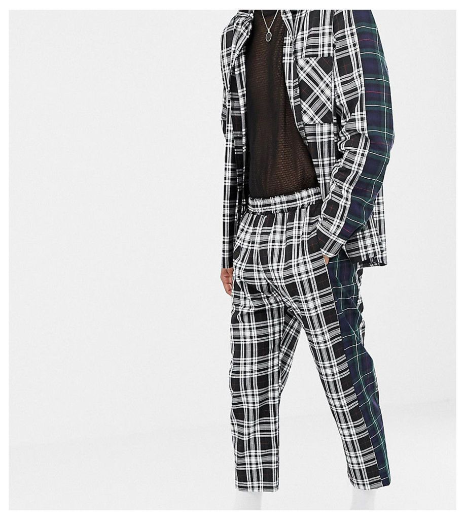 Milk It Vintage relaxed check trousers with contrast side stripe-Black