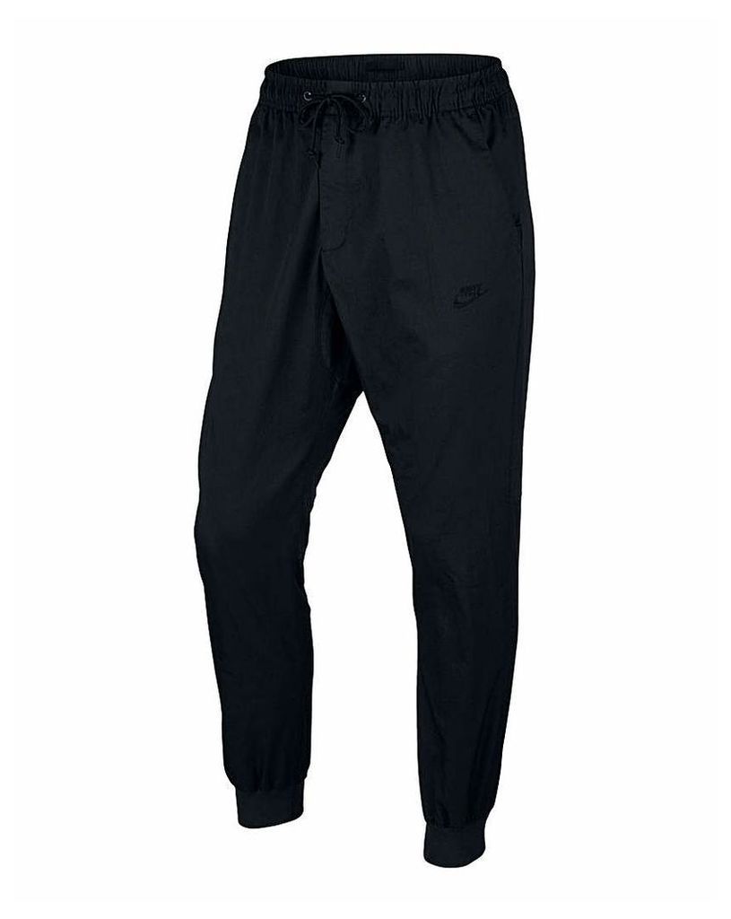 Nike Tapered Woven Jogging Bottoms 31in