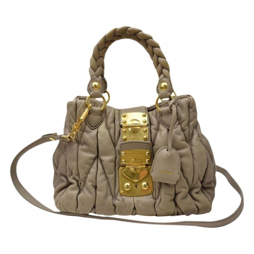 Coffer patent leather handbag