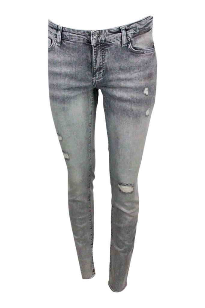 Skinny Jeans In Stretch Denim With Rips On The Leg