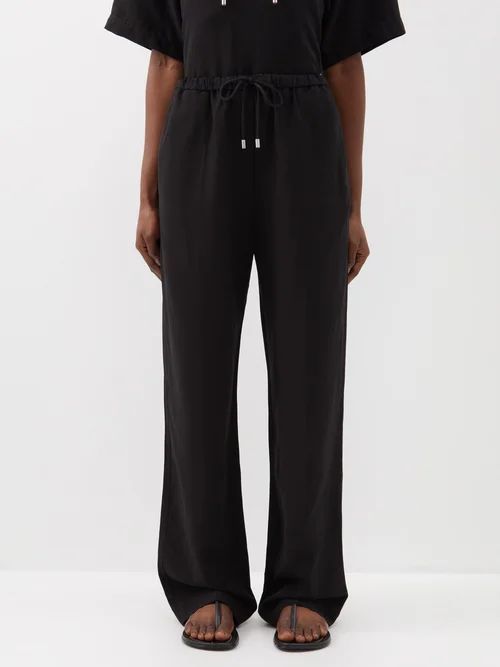 Drawstring-waist Lyocell-blend Trousers - Womens - Black