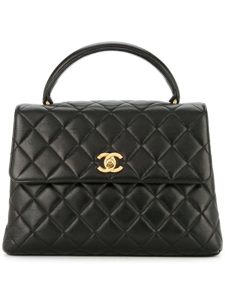 1996-1997 top handle quilted bag