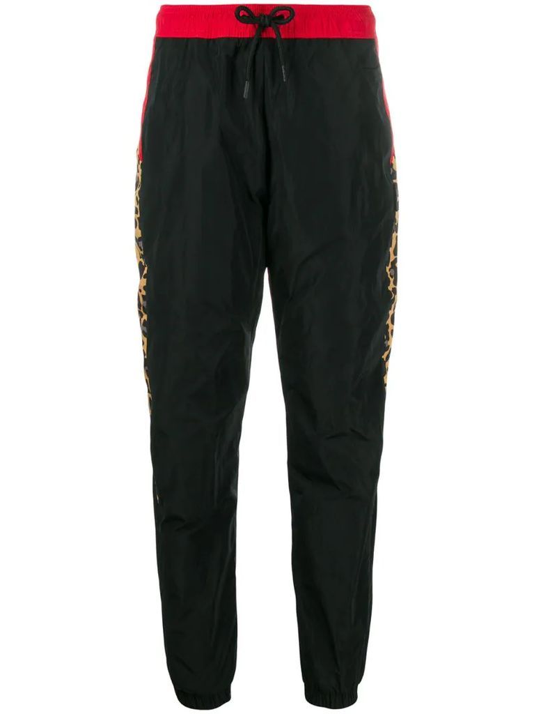 leopard-print track pants