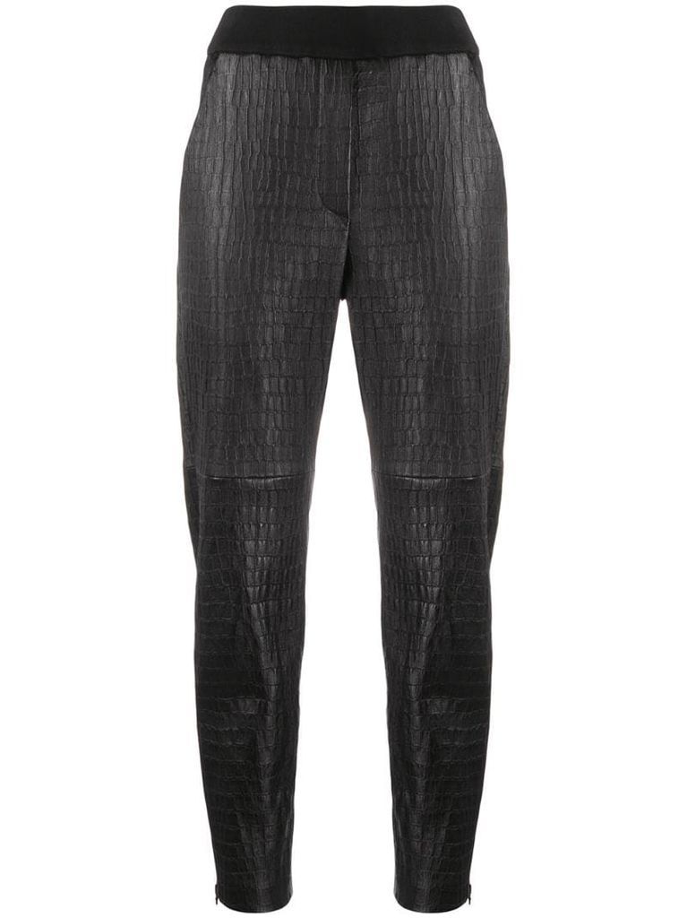 crocodile-effect leather trousers