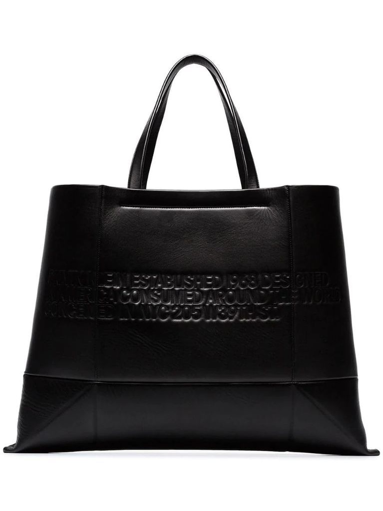 black geometric embossed leather tote