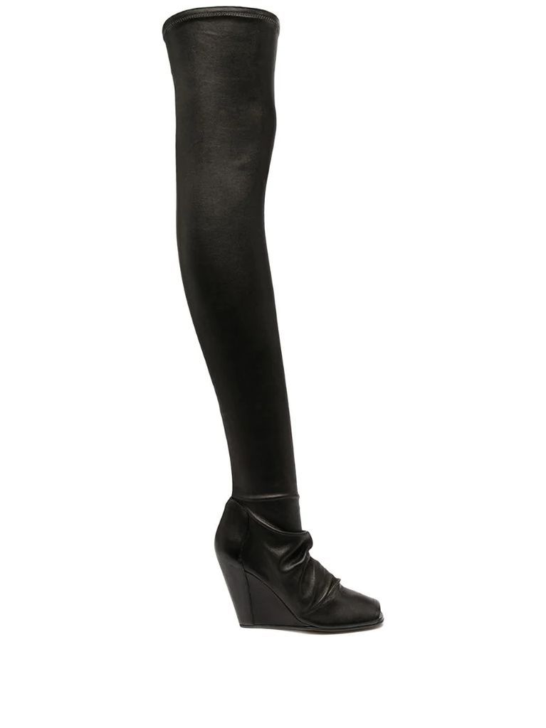 thigh-high fitted boots