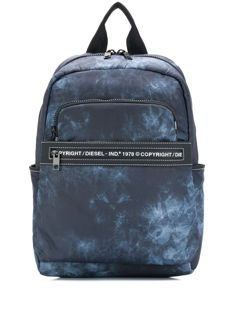 faded print backpack