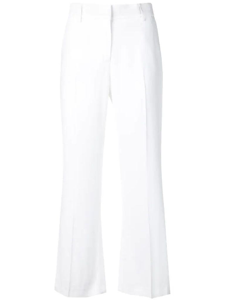 white flared trousers