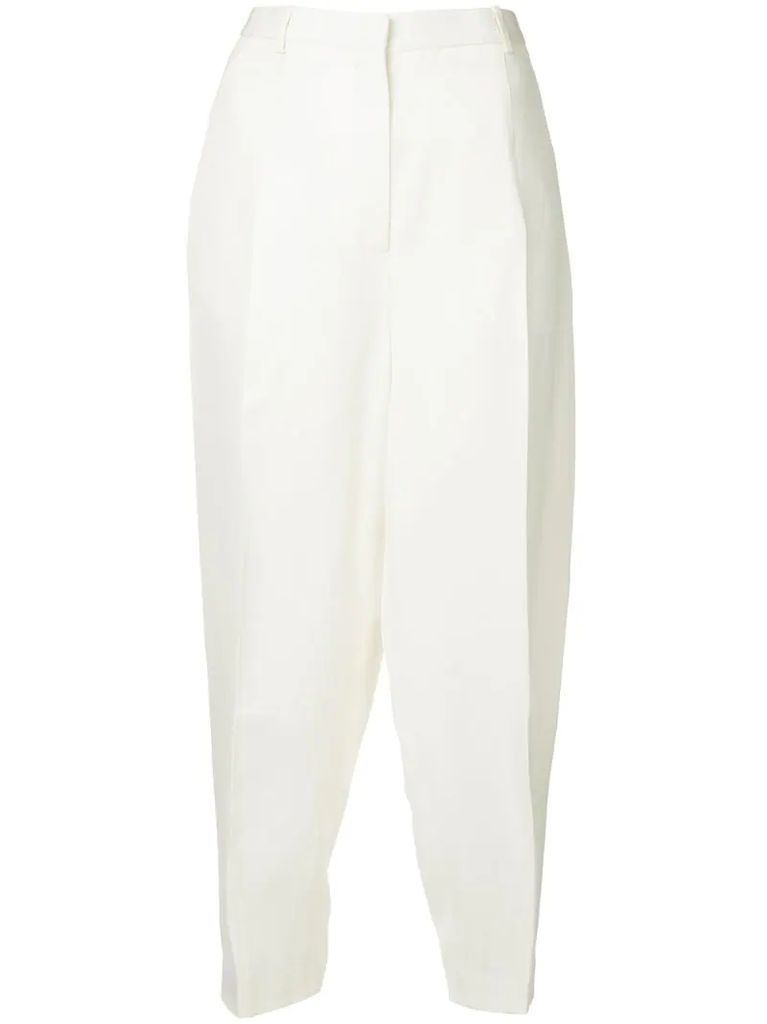 creased tapered trousers