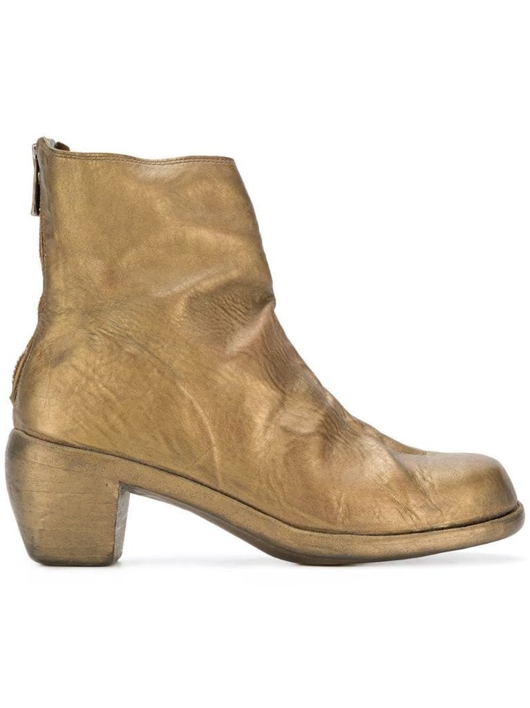 worn low heel boots