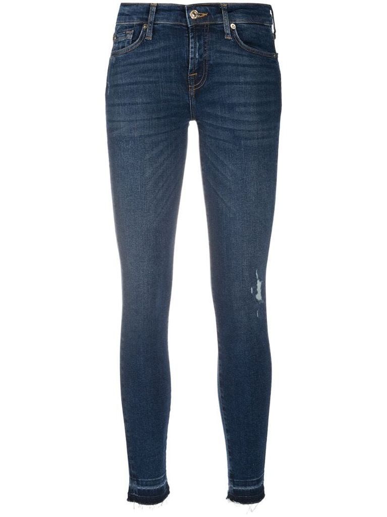 Illusion distressed skinny jeans