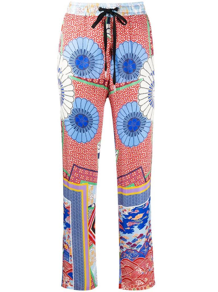 high-waisted patterned trousers