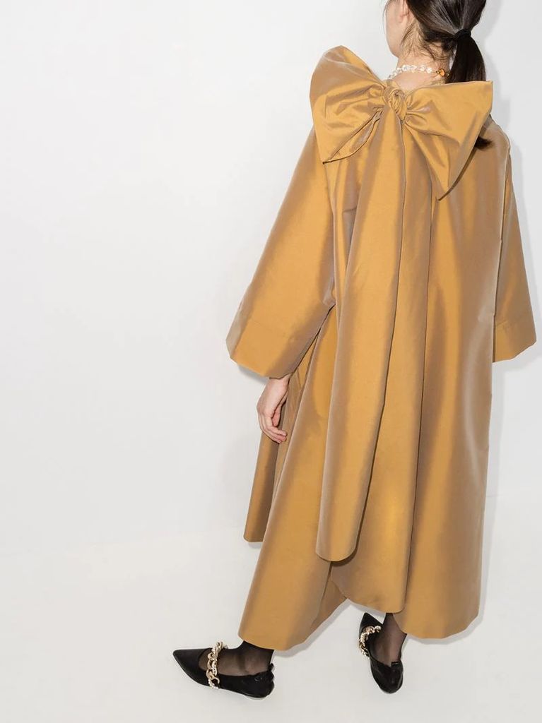 Christian bow-detail trench coat