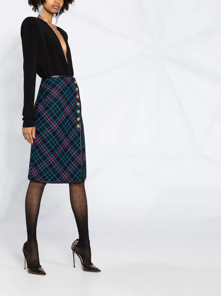 knee-length tartan skirt