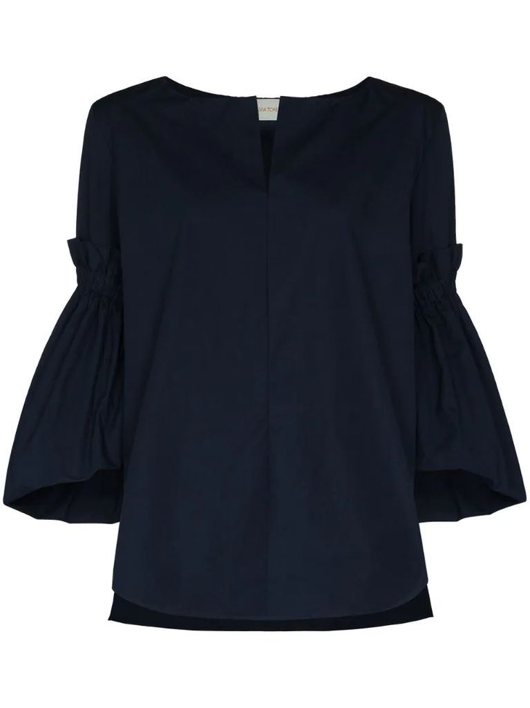 bell-sleeved cotton blouse