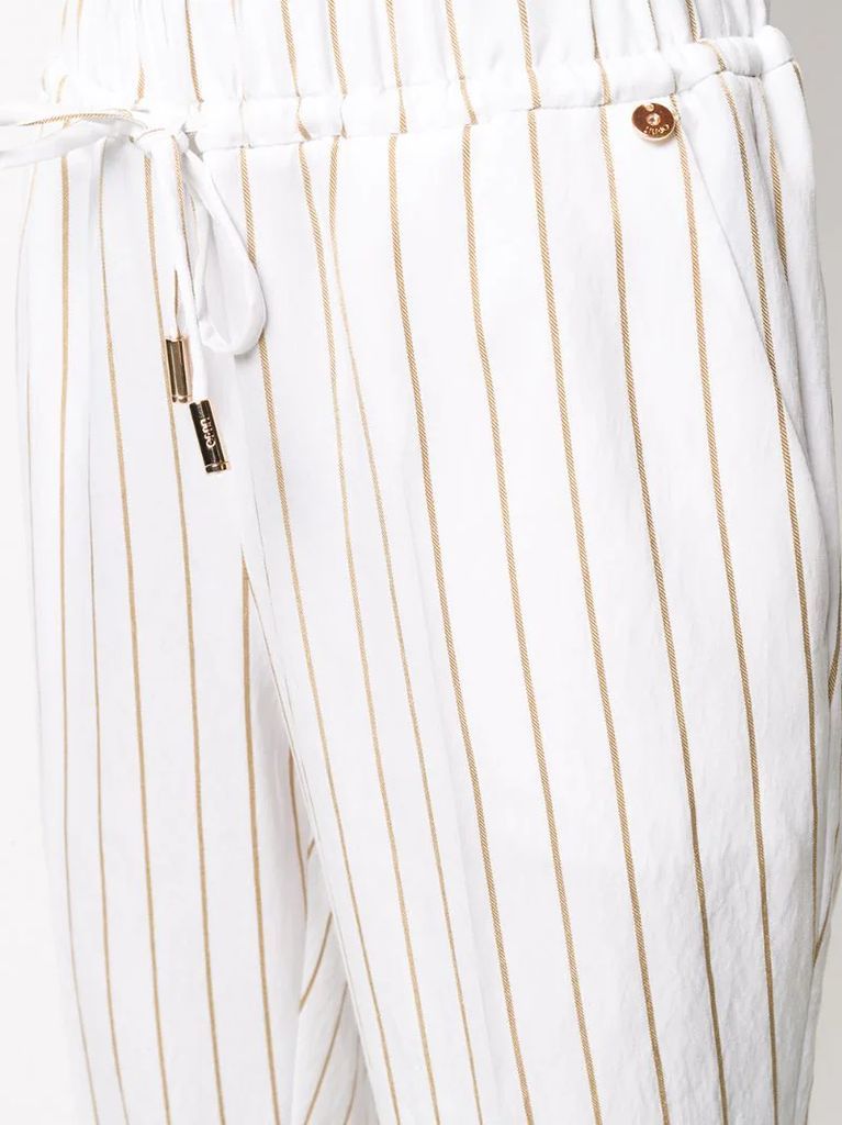 high-rise tapered pinstriped trousers