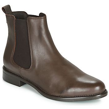 women's Mid Boots in Brown. Sizes available:3.5