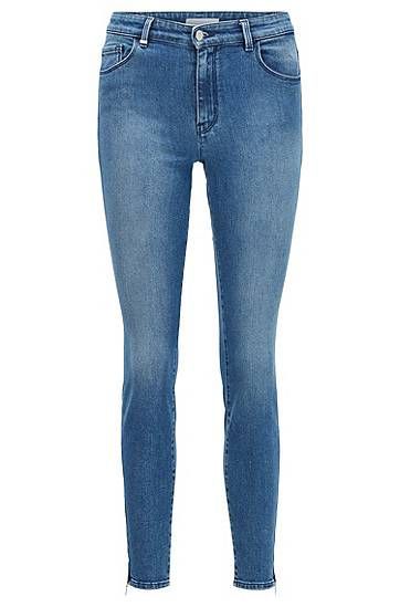 Skinny-fit jeans in stretch denim with zipped hems