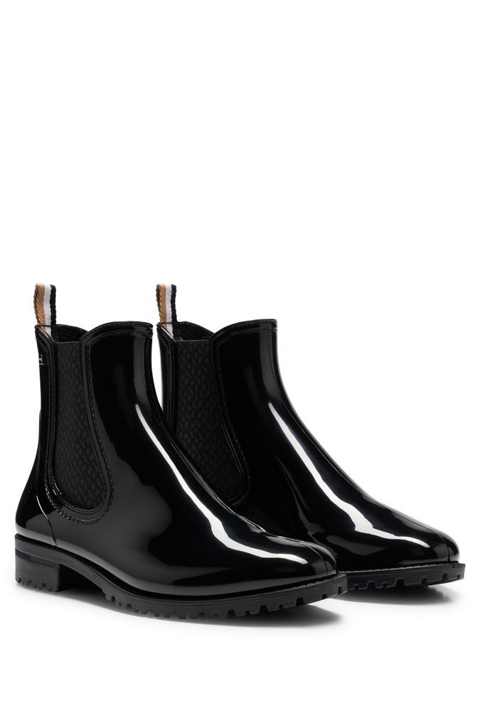 Glossy Chelsea-style rain boots with branded trim