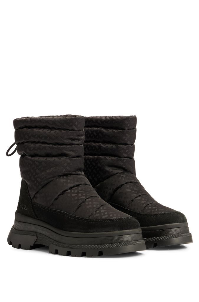 Quilted boots with monogram detailing