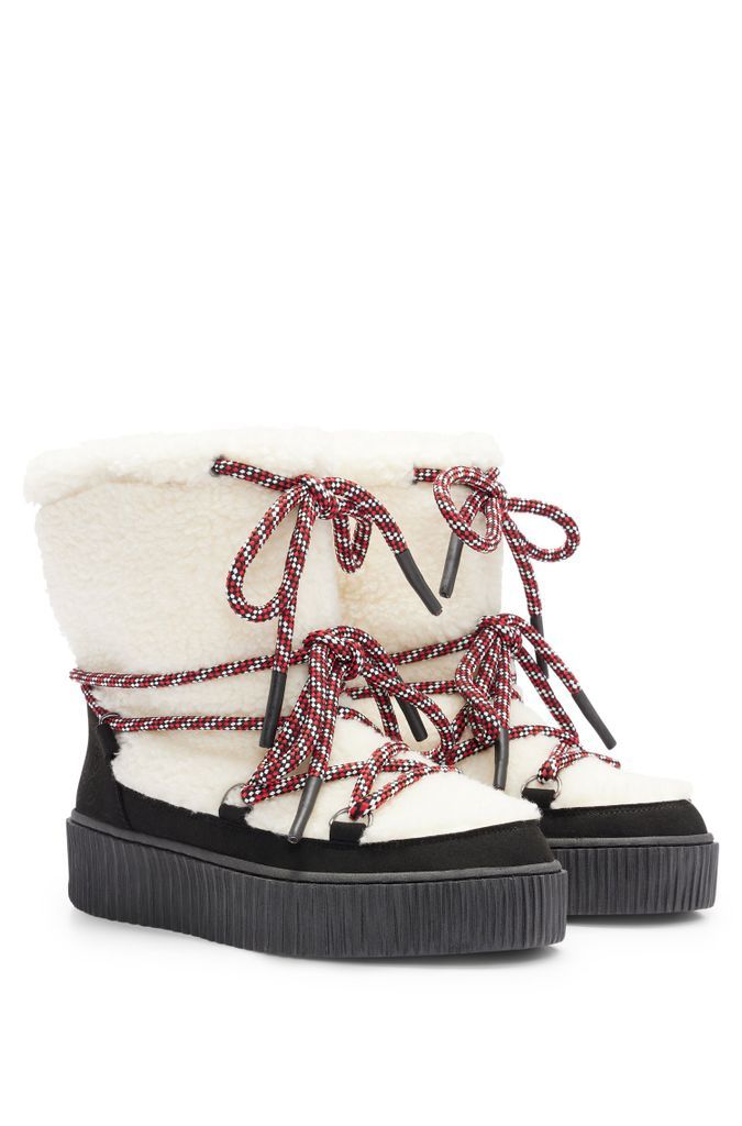Teddy winter boots with lace-up details