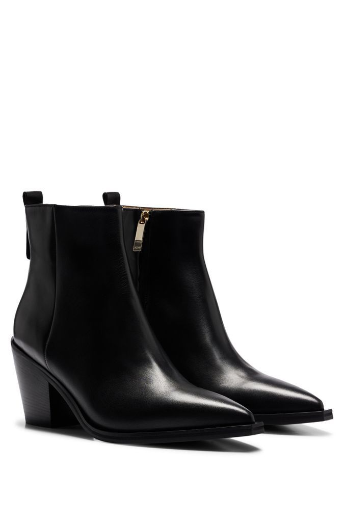 Leather boots with Cuban heel and pointed toe