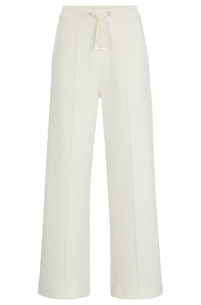 Cotton-blend drawstring trousers with tape trims
