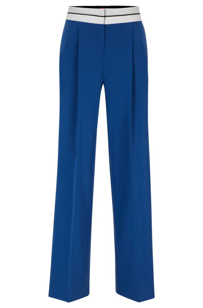 Relaxed-fit trousers with inside-out waistband detail