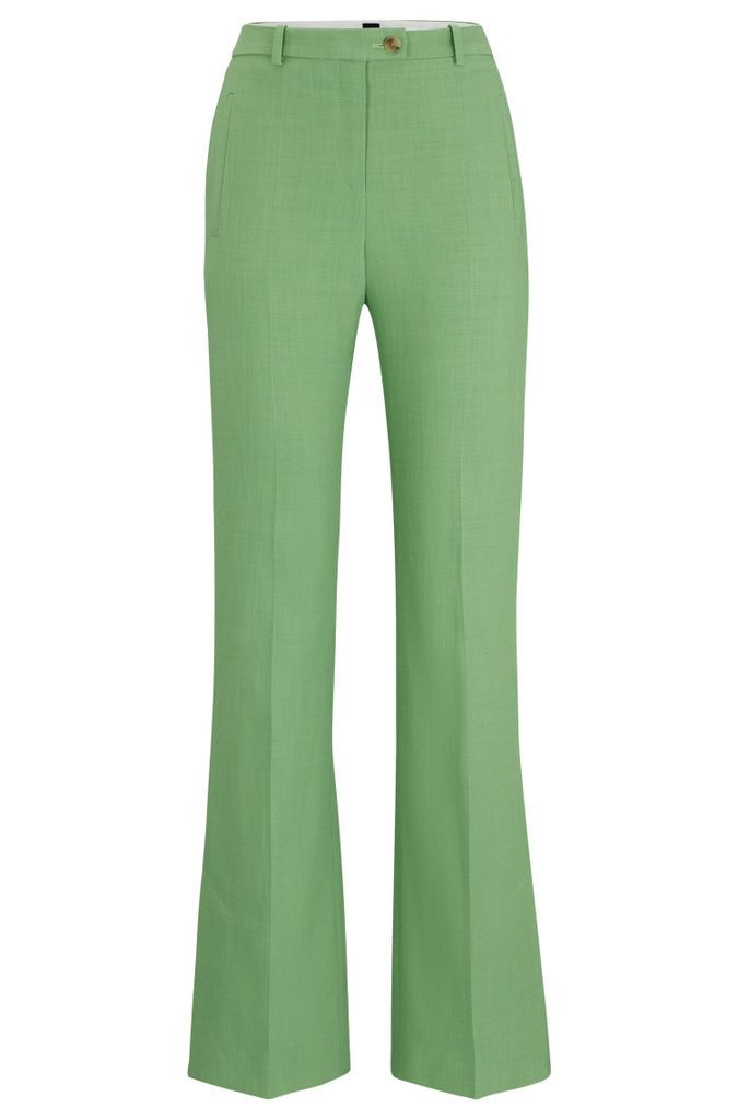 Slim-fit trousers with flared leg in stretch material