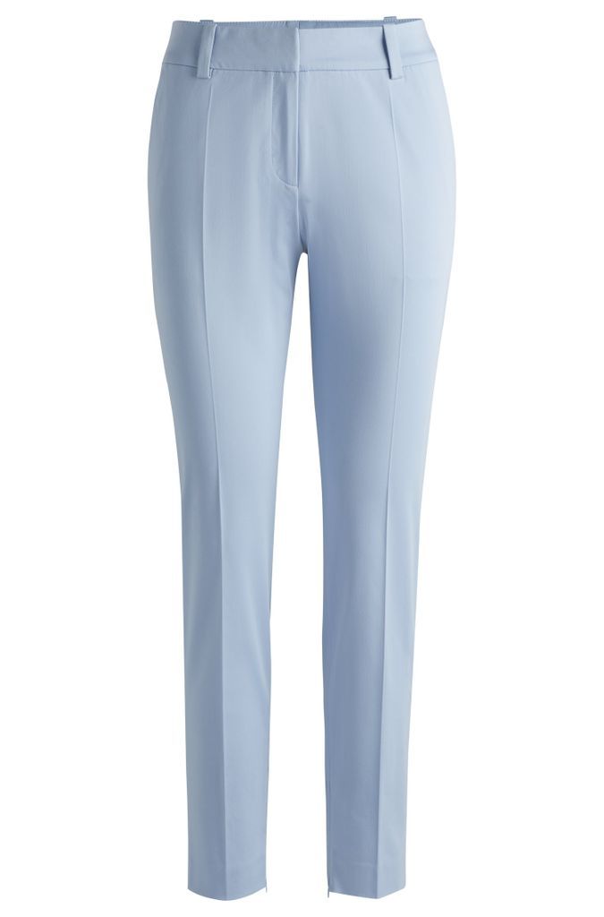 Slim-fit cropped trousers with zipped inner hems
