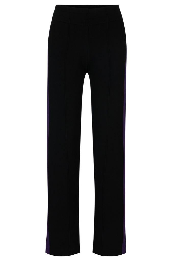 NAOMI x BOSS knitted trousers with contrast side stripe