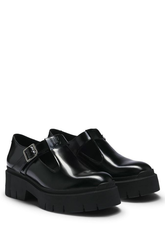 Mary-Jane shoes in leather with stacked logo