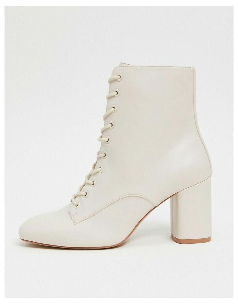 lace up ankle boots in white