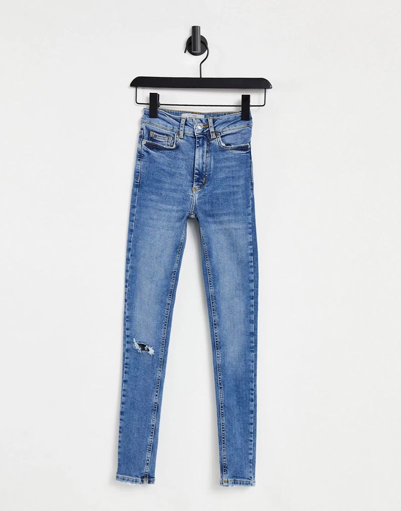 fray hem ripped mid rise jean in blue