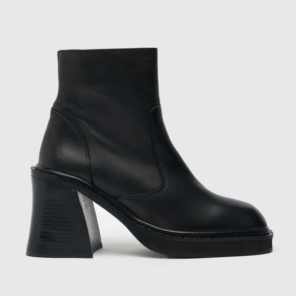 the edit porter leather boots in black