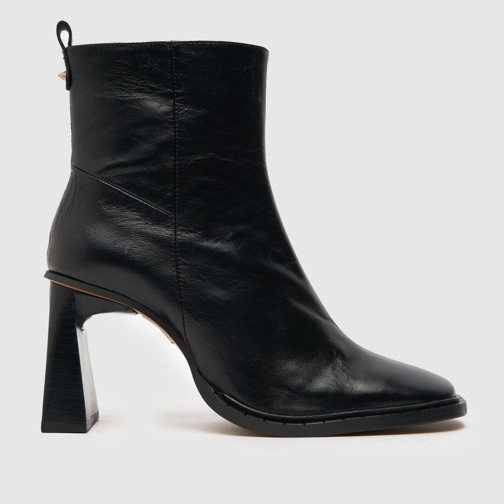 the edit peyton heel boots in black