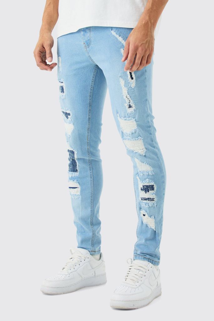 Men's Skinny Stretch All Over Ripped Light Blue Jeans - 28R, Blue
