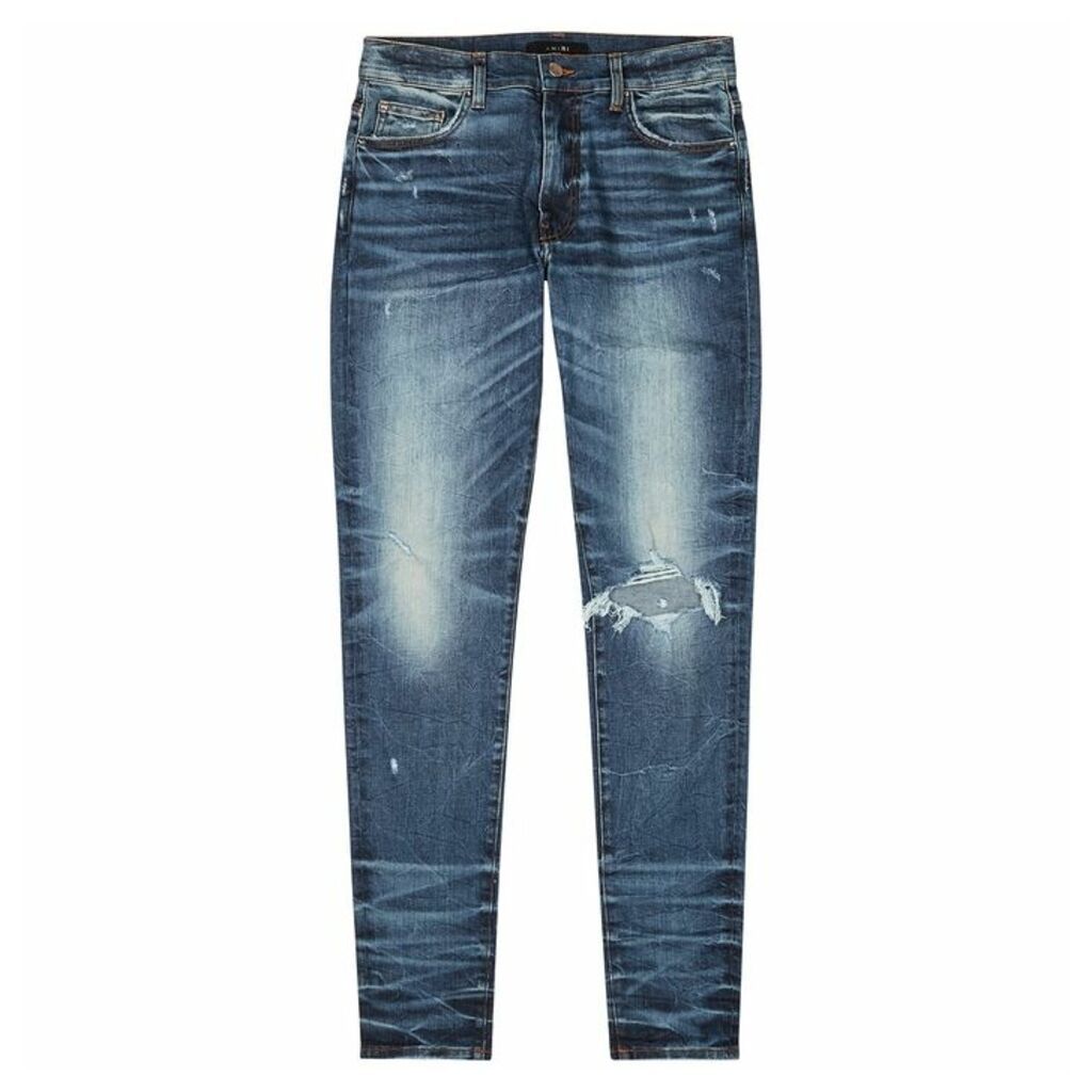 Amiri Blue Distressed Skinny Jeans