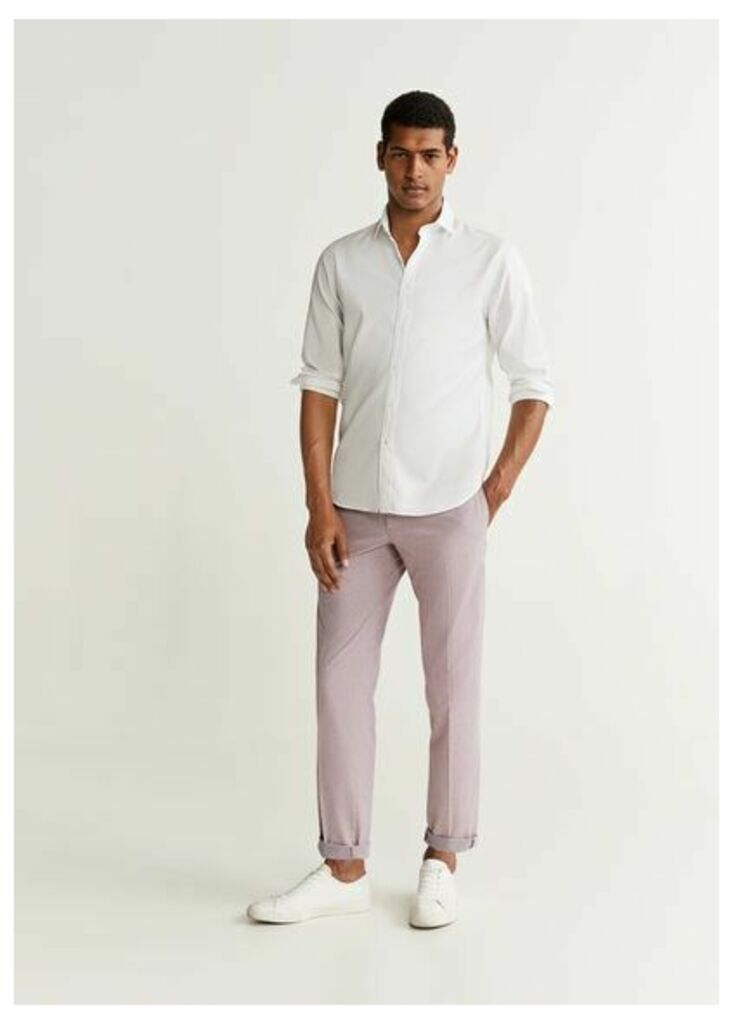 Tapered fit pleated trousers