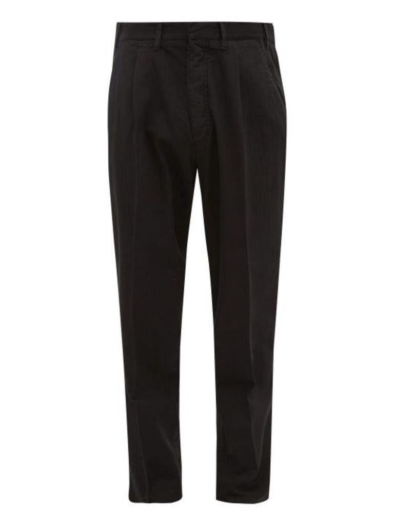The Gigi - Tapered Herringbone Cotton-blend Trousers - Mens - Black