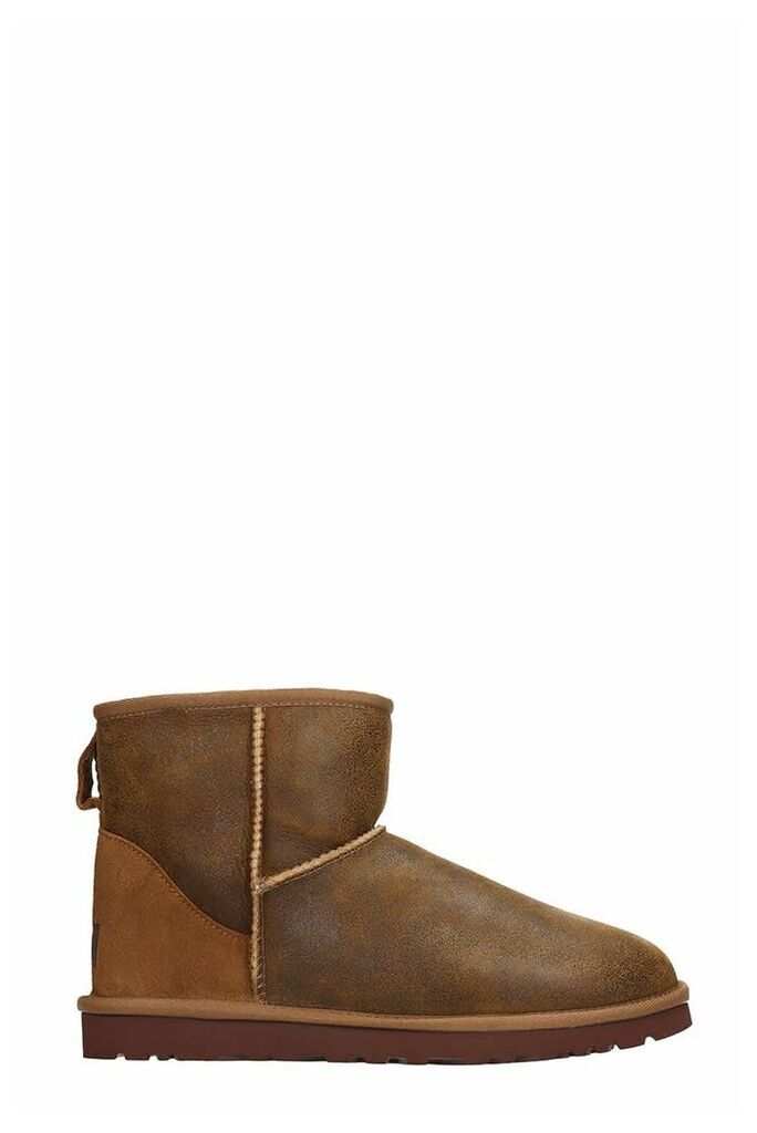 UGG Mini Classic Low Heels Ankle Boots In Leather Color Leather